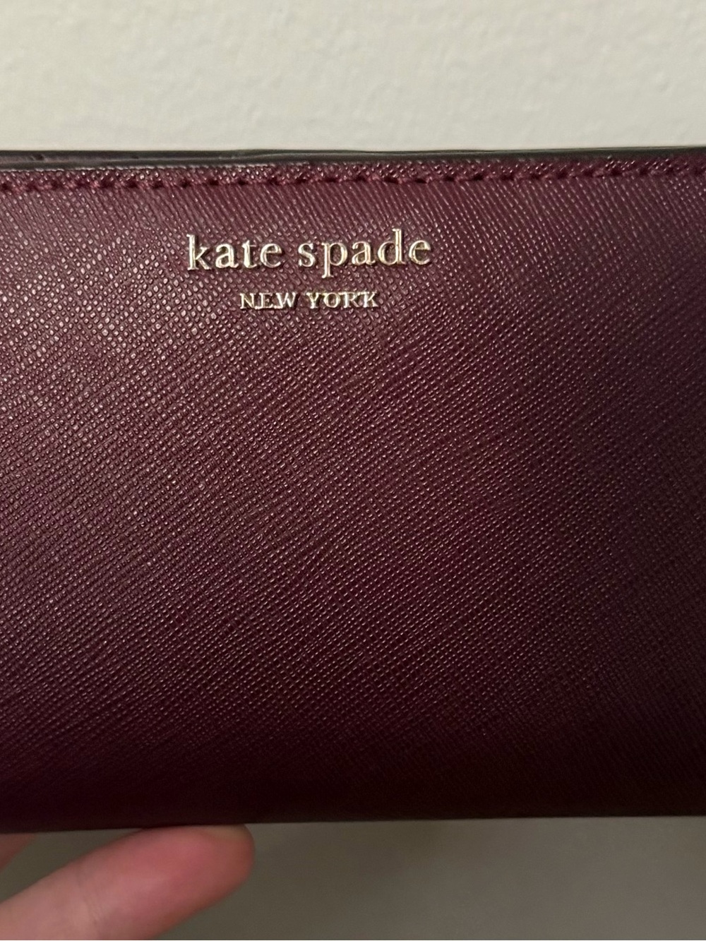 Kate Spade Burgundy Saffiano Leather Medium Bifold Wallet with Gold Logo